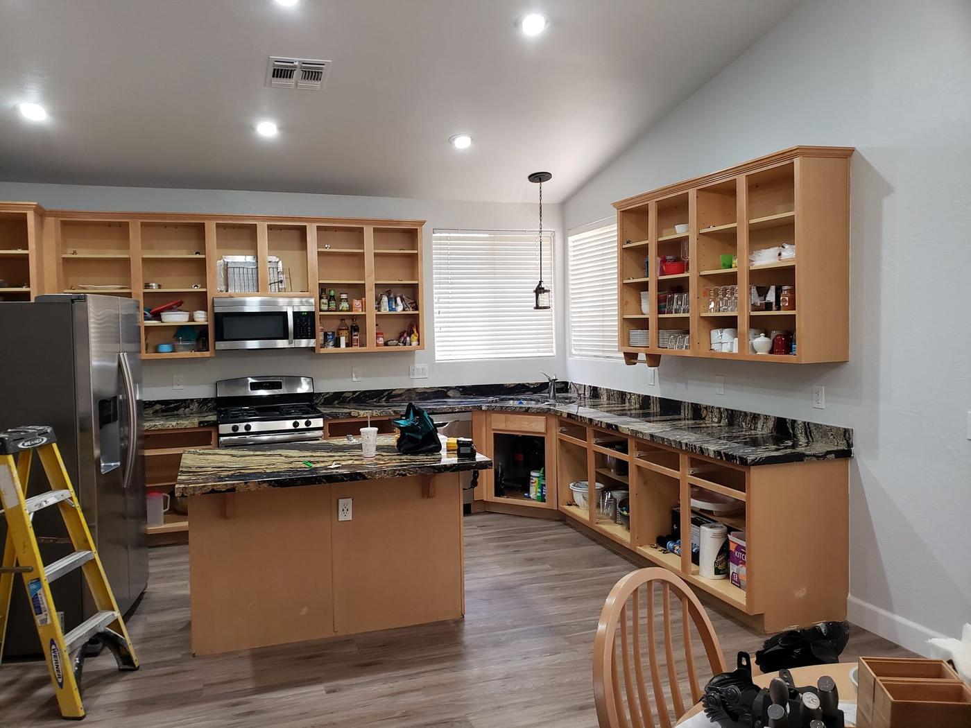 Before: original oak cabinets, doors off
